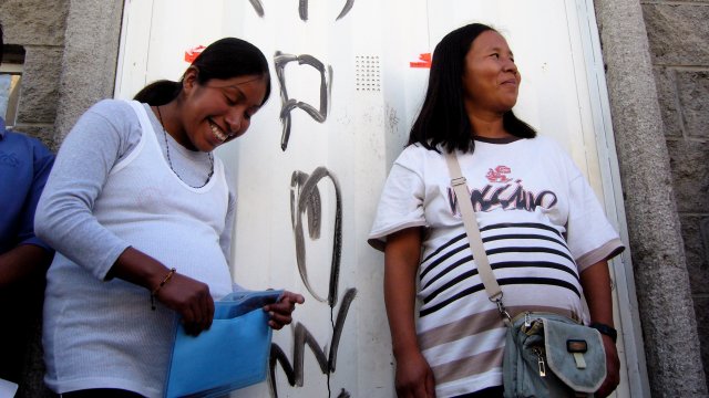 Pregnant workers in line to vote